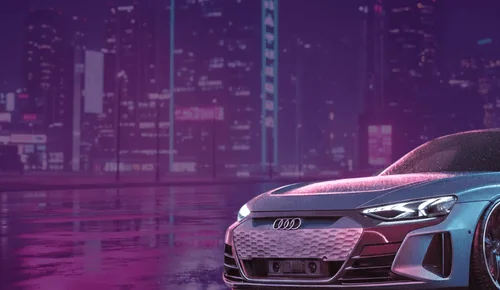 Berline électrique grise devant des tours éclairées en violet